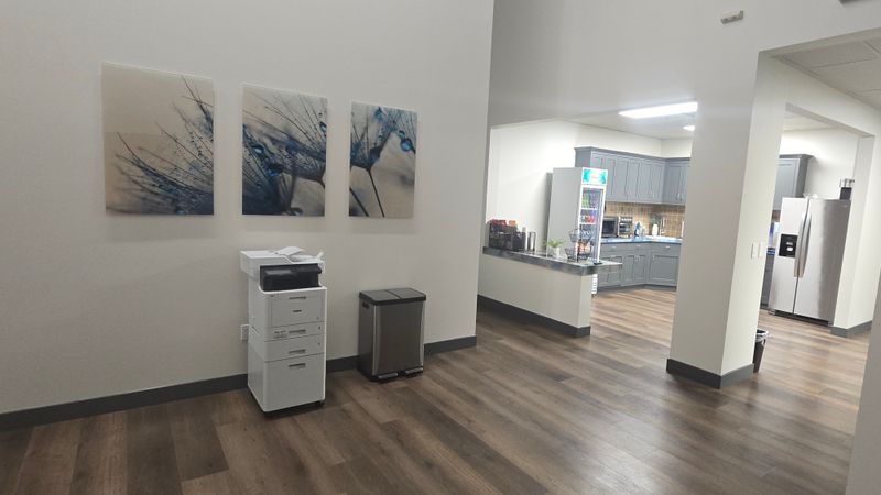 Hallway with printer and art